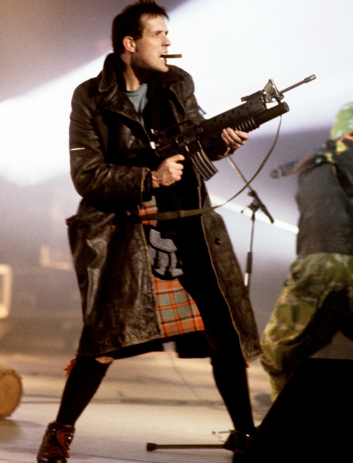 http://www.contactmusic.com/images/feature-images/bill-drummond-the-klf-fires-machine-gun-blanks-brit-awards-pa-4730684.jpg