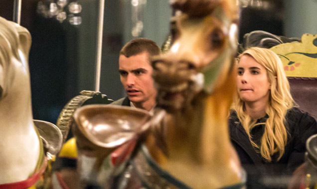 Emma Roberts and Dave Franco at a carousel set