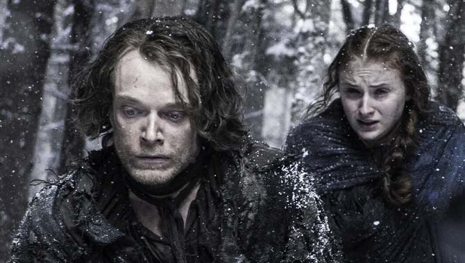 Sophie Turner and Alfie Allen in Game Of Thrones