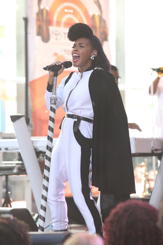 Janelle performing onstage over the summer