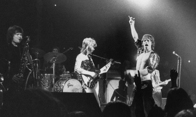 Bobby Keys (Left) & The Rolling Stones performing at the Roundhouse, London, 14th March 1971. Credit Getty / Evening Standard.