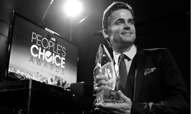 Matt Bomer with the 'Favourite Cable TV Actor' award at the 41st People's Choice Awards (Credit Frazer Harrison - Getty Images)