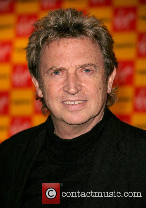 Andy Summers of rock band The Police signs