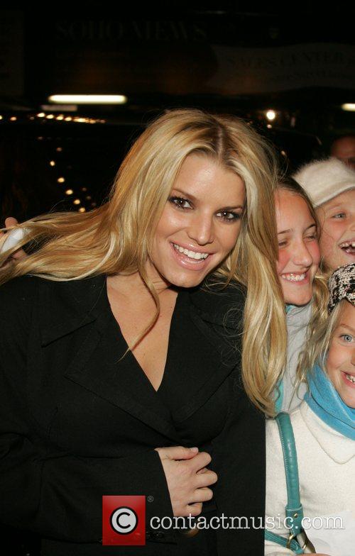 Jessica Simpson greets young fans as she leaves