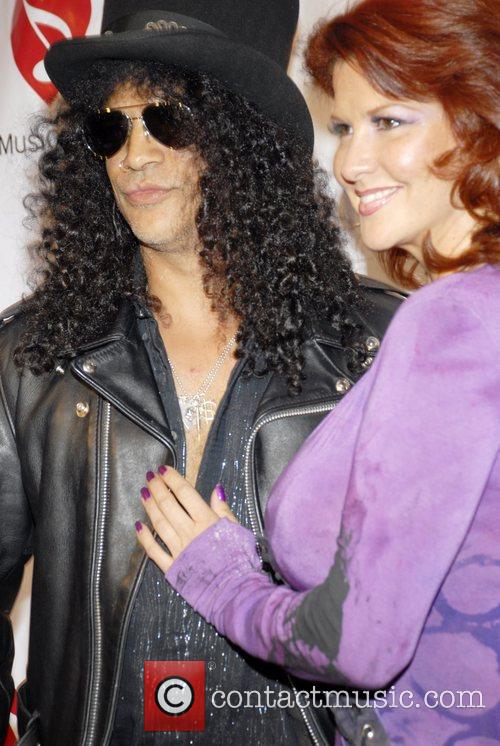 Slash and his wife The 4th Annual MusiCares