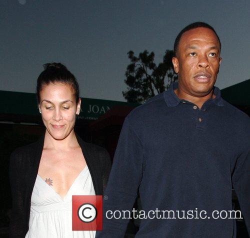 Dr Dre and his wife Nichole Threatt leaving