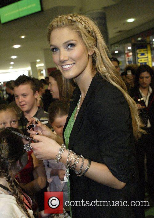 delta goodrem performs live and signs copies of her triple ...