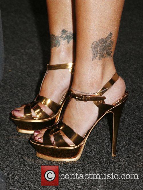  Alyssa Milano's feet Gotta say the combination of the heels tattoos 