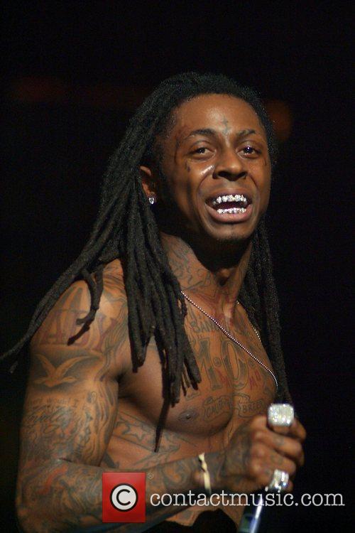 Lil Wayne Baby Kiss. he#39;s kissing with aby.