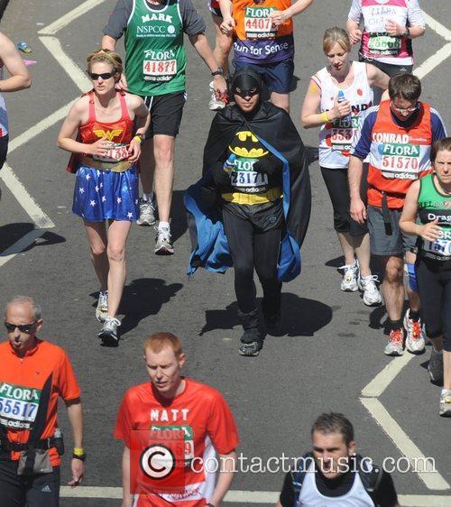 a_man_dressed_as_batman_runs_along_the_embankment_during_the_london_marathon_2391496.jpg