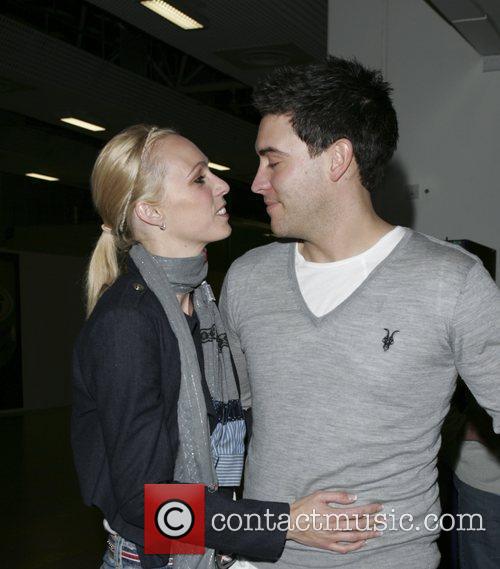 kevin sacre and camilla dallerup. Camilla Dallerup and her fiance Kevin Sacre arriving at at Heathrow Airport