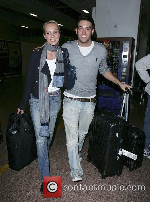 camilla dallerup and kevin sacre. Camilla Dallerup and her fiance Kevin Sacre arriving at at Heathrow Airport