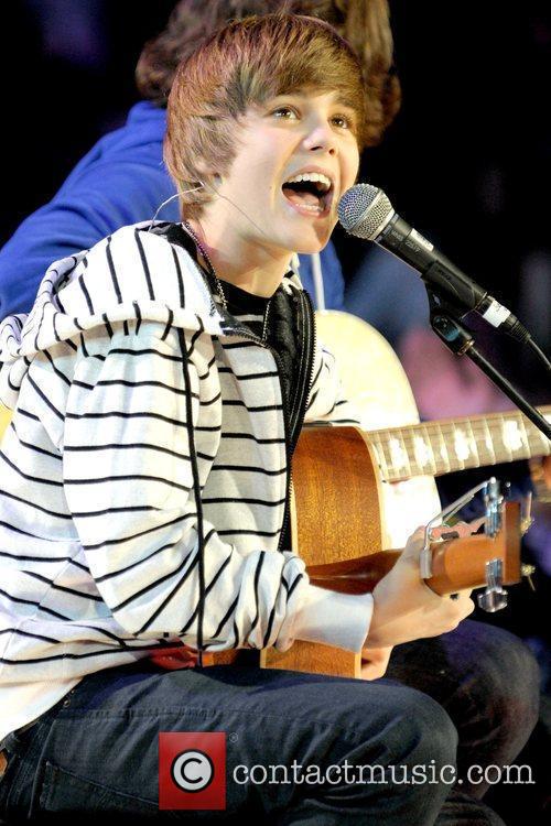 justin bieber on stage singing. As if Justin#39;s natural singing