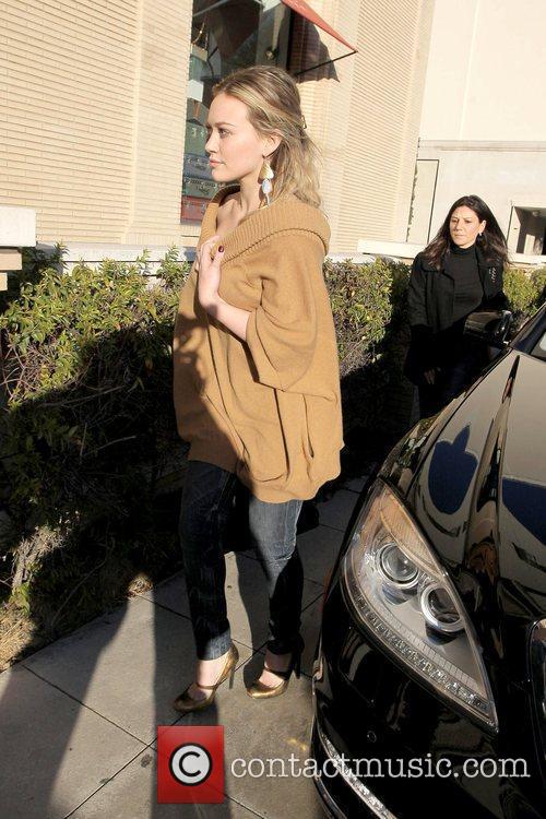 Hilary Duff shopping in Beverly 
Hills while wearing a camel sweater