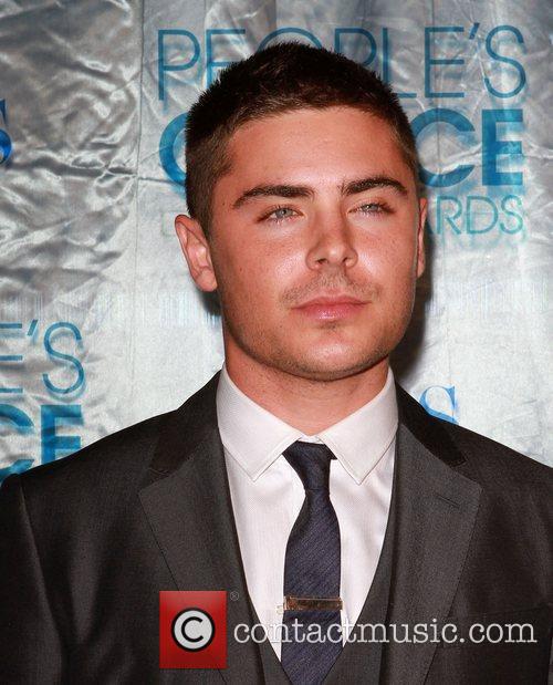 zac efron 2011 calendar. 2010 zac efron 2011 calendar.