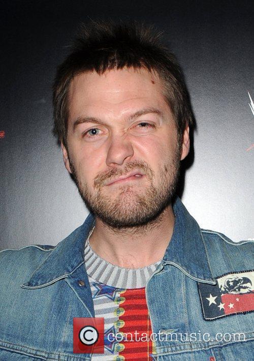 Tom Meighan and lead singer of