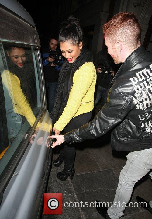 Vanessa White leaves Nobu Berkeley with a male