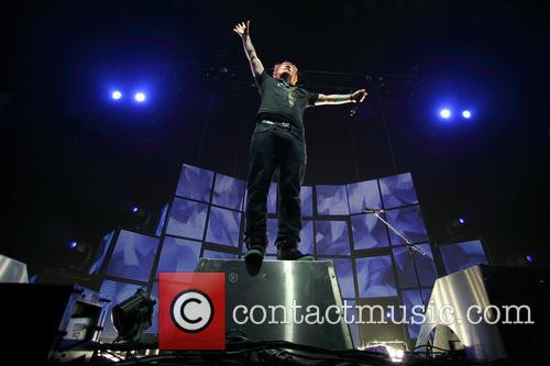 Ed Sheeran in a slightly precarious position