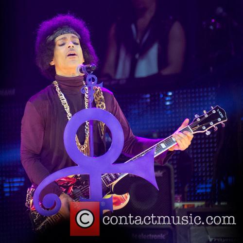Prince performing in 2014
