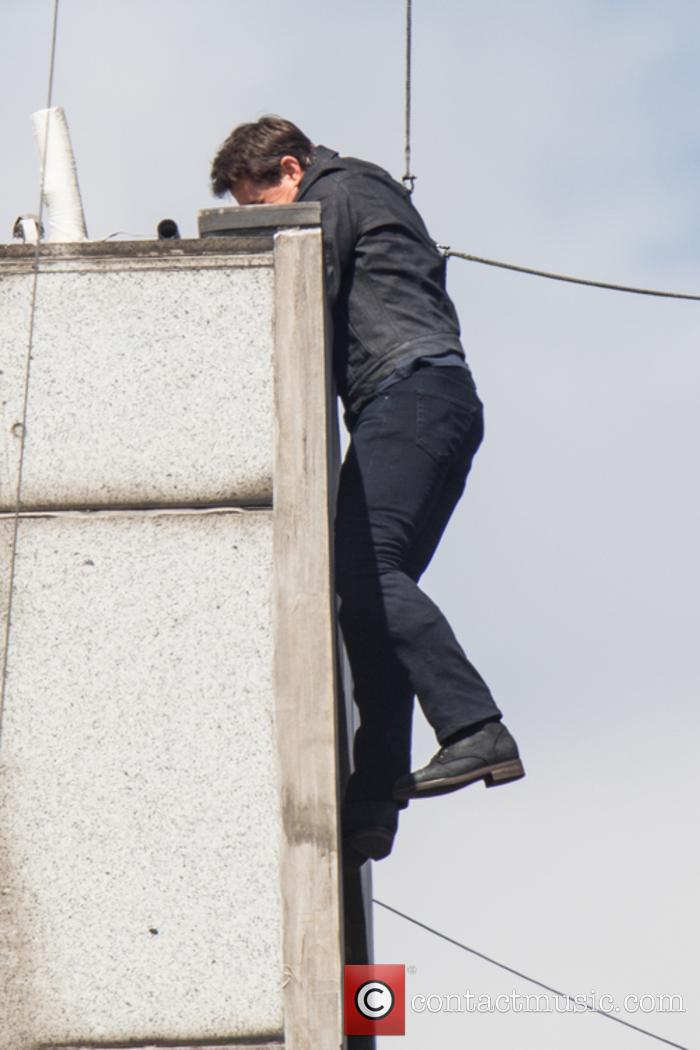 The actor crashes into the wall of a building