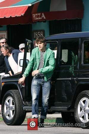 ashton kutcher twin brother. Ashton Kutcher on the film set for his upcoming movie at Robertson Boulevard 