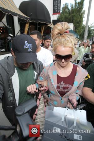 Britney Spears - Britney Tattoos Spark Boom In Business