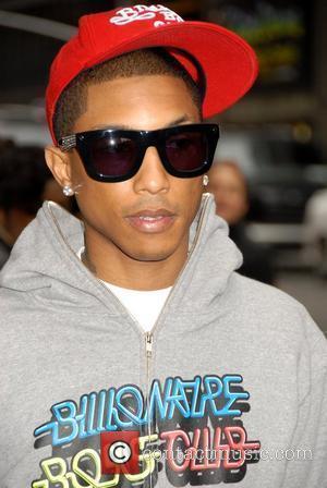 pharrell williams. Pharrell Williams outside the