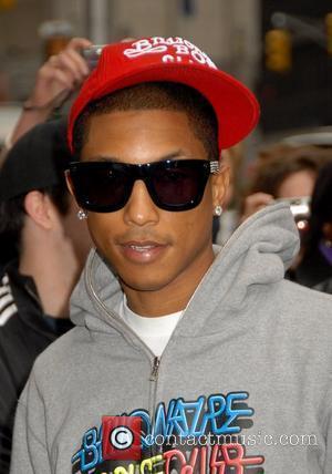 pharrell williams. Pharrell Williams outside the