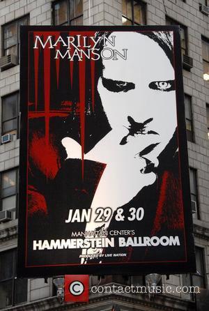 Marilyn Manson 's Rape of the World Tour billboard on Broadway advertising 