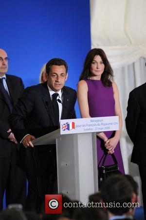 french president nicolas sarkozy wife. Nicolas Sarkozy and wife Carla