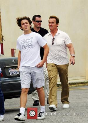 Arnold Schwarzenegger and his son Patrick leaving a restaurant after having lunch with their family in Brentwood