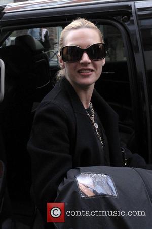 Kate Winslet leaving her Manhattan residence en route to a photo shoot