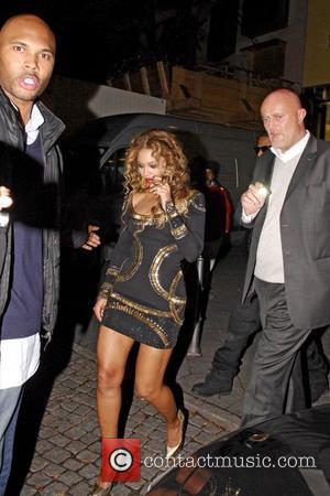 Beyonce Knowles and husband Jay-Z leaving Felix nightclub after the MTV 
