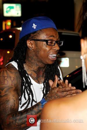 (From Feb 24, 2009) Lil Wayne arrives at Manhattan courthouse for hearing on