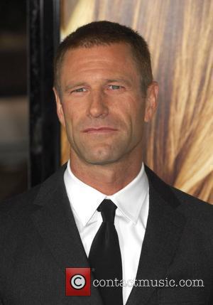 aaron_eckhart_2576082.jpg