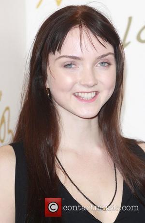 lily cole tattoo. Lily Cole – Cole Lands Lead In