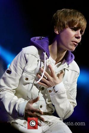 justin bieber tour photos. Justin Bieber performing at