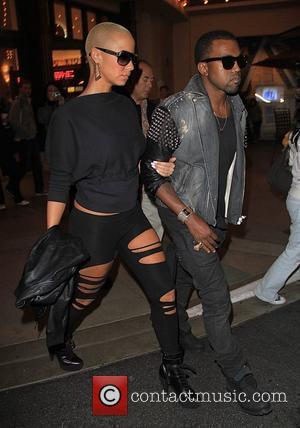 kanye west new album 2010. Kanye West and Amber Rose