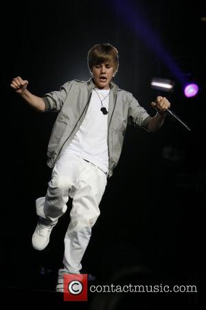 Justin Bieber - Biebers Door Smash. Contactmusic / 21st May 2010