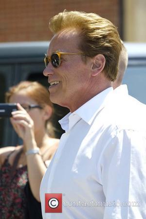 arnold schwarzenegger son. Arnold Schwarzenegger is seen