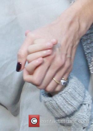 Heidi Klum still wears a ring on her wedding finger as she leaves a restaurant in Brentwood
