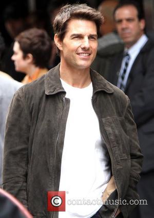 Tom Cruise filming on the set of 'Oblivion' at the foot of the Empire State Building New York, City, USA - 13
