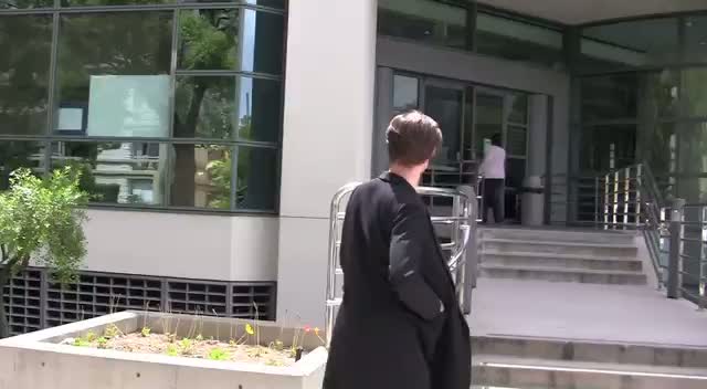 Matt Smith walking and entering an office building in Beverly Hills