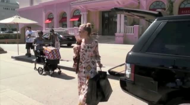 Rachel Zoe and her son leaving Barneys of New York in Beverly Hills