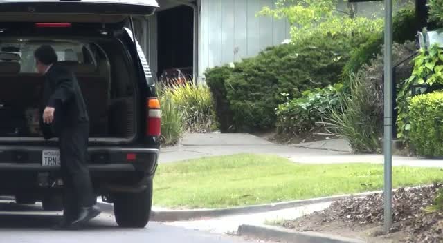 Mark Zuckerberg walking to his car, to head out for a low key lunch to celebrate his 27th birthday with girlfriend Priscilla Chan