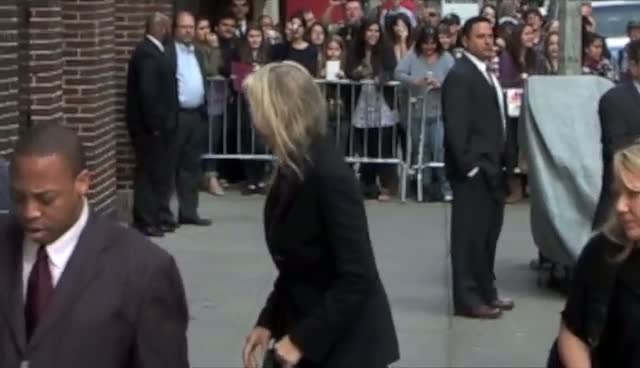 A Cheery Annie Leibovitz Takes Photo With Waiting Fan