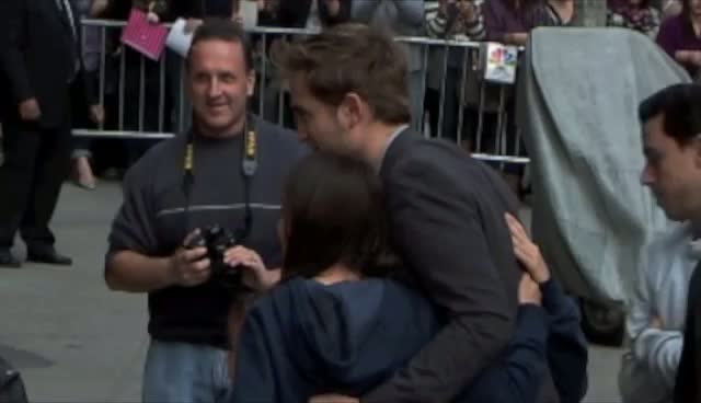 Robert Pattinson Takes Photos With Lucky Fans