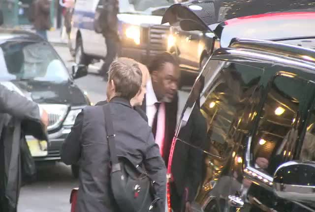 Martin Freeman Waves At Paps Outside David Letterman Studio