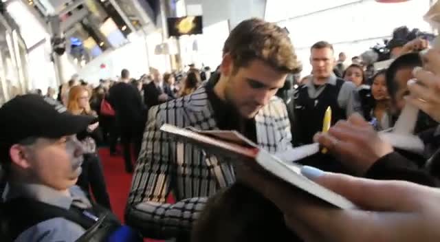Liam Hemsworth Wears Eye Catching Jacket At Hunger Games Premiere