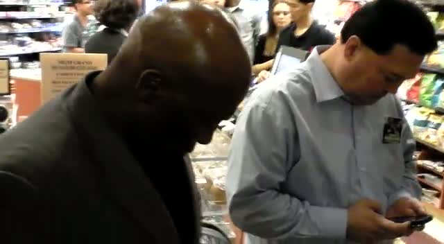 Earnie Shavers Signs Boxing Glove For Fan In Vegas